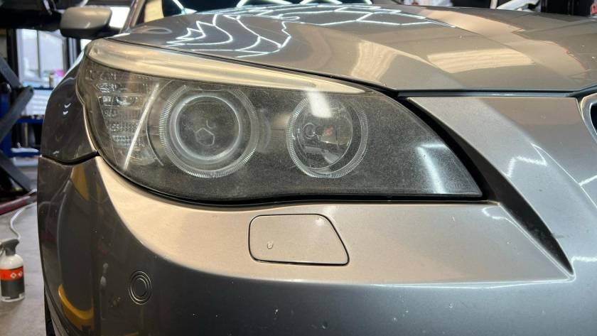 Cloudy oxidised BMW headlight before professional headlight restoration in Tullamore
